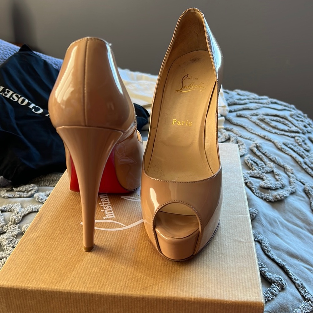 Christian Louboutin nude pumps size 39 for sale.